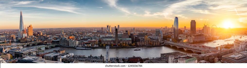 View to the skylne of London along the Thames river during sunset time, United Kingdom - Powered by Shutterstock