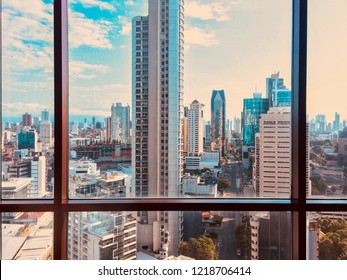 view from skyscraper window on  modern city skyline