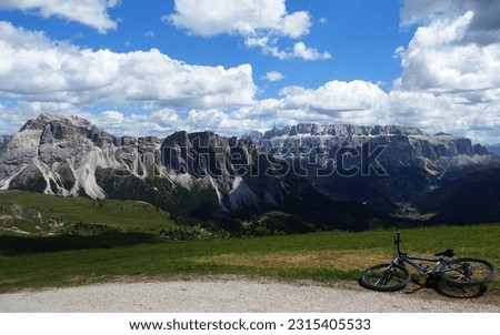 View from the slopes of Seceda on Mt. Muntijela and the Mont de Stevia cliffs and Mountain Group Sella in the distance