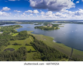 View Of Small Islands On The Lake In Masuria And Podlasie District, Poland.
Blue Water And Whites Clouds. Summer Time. View From Above.