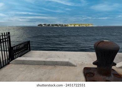 View of a small isolated island from a dock on Key West coast, FL
 - Powered by Shutterstock