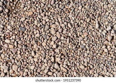 View Of Small River Stones. Background From Stones