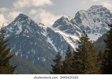 View of the Snow Covered Mountain Peaks and Forest at North Cascades National Park in Washington State, USA - Powered by Shutterstock