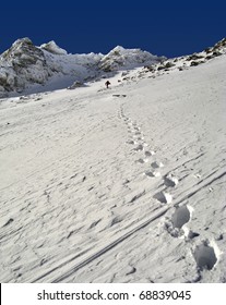 View Of Snow Mountain And Hiking Man. Slovakian  High Tatra Mountains.