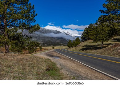 View to the snow-covered mountains of the Rocky Mountain National Park