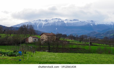 view of the snowed Aizkorri mountains in the Basque country