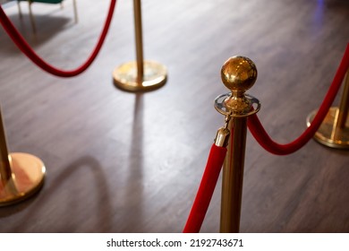 A View Of Some Velvet Rope Inside A Room.