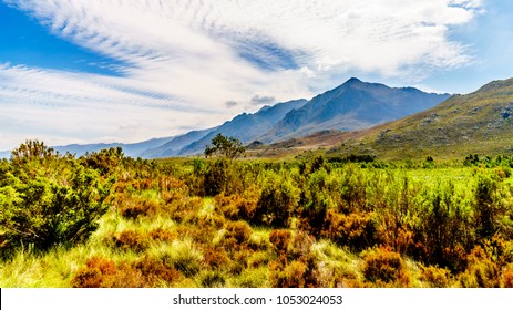 View from the southern end of the Franschhoek Pass, beside the Theewaterkloofdam, looking toward the  Wemmershoek and Franschhoek Mountain ranges in the Western Cape province of South Africa - Shutterstock ID 1053024053