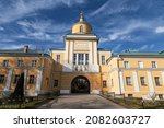 View of the southern gate with the gateway church of St. Mitrofan of the Voronezh Pokrovsky Khotkov monastery in autumn. Khotkovo, Moscow region, Russia