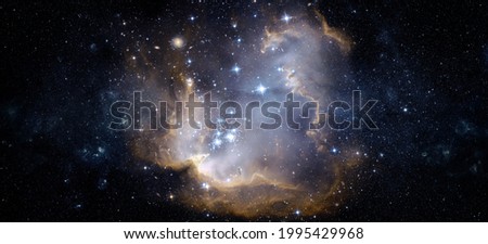 A view from space to a galaxy and stars. Universe filled with stars, nebula and galaxy,. Panoramic shot, wide format. Elements of this image furnished by NASA.