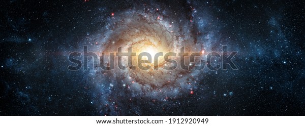 A view from space to a spiral galaxy and stars.\
Universe filled with stars, nebula and galaxy,. Elements of this\
image furnished by NASA.