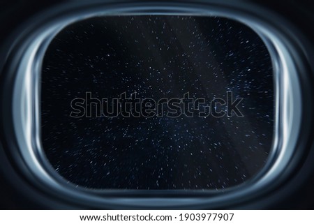 View from a spacecraft window during Interstellar travel in the dark deep space