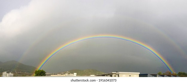 View Of A Spectacular Rainbow Half Full Circle