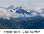 A view of a spectacular snow capped peak in the Andes Mountain range as seen from Maras, Peru. Maras is a town in the Sacred Valley of the Incas, 40 kilometers north of Cusco in the Urubamba Province.