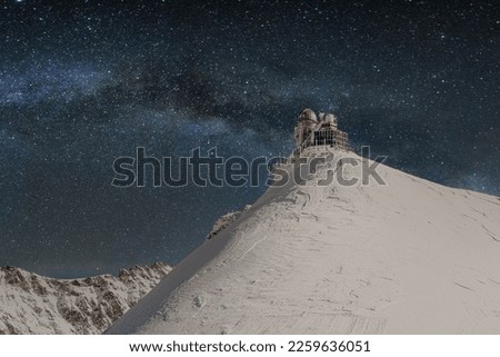 View of the Sphinx Observatory on Jungfraujoch, one of the highest observatories in the world located at the Jungfrau railway station, Bernese Oberland, Switzerland by night. Travel concept.