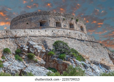 View of Spinalonga fortress. The island is in the Gulf of Elounda, Crete, Greece, in Lasithi, next to the town of Plaka.Fortified by the Venetians in 1579.Was used as a leper colony. - Shutterstock ID 2235739013