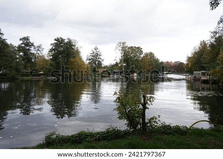 
View of the Spree River in the evening in October. The Spree is, with a length of approximately 400 kilometres, 250 mi, the main tribute of the River Havel. Berlin, Germany
