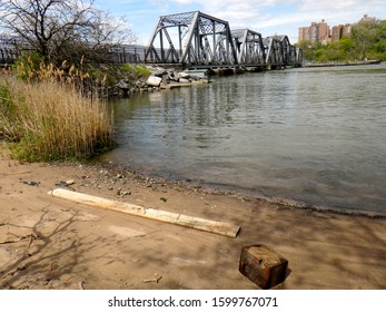 View Of The Spuyten Duyvil Bridge At Inwood Hill Park In New York City, New York