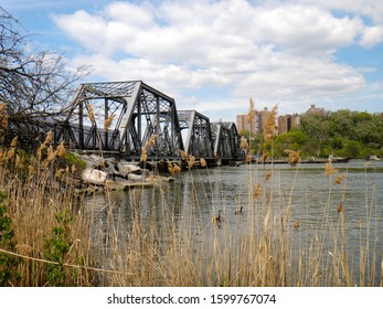 View Of The Spuyten Duyvil Bridge At Inwood Hill Park In New York City, New York