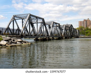 View Of The Spuyten Duyvil Bridge At Inwood Hill Park In New York City, New York