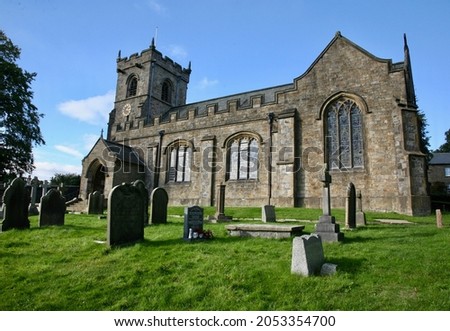 A view of St Leonard's church in the village of Downham, Clitheroe, Lancashire, England, Europe