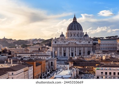 View of St. Peter's Basilica in the Vatican city, Rome, Italy. Saint Peter Basilica in Vatican City at Rome, Italy and Street Via della Conciliazione at sunset sky. - Powered by Shutterstock