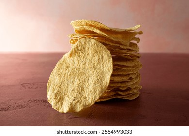 A view of a stack of tostada shells.