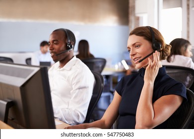 View Of Staff In Busy Customer Service Department