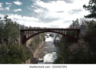 View of the steel arch Ausable Chasm Bridge and the Ausable River in Keeseville, New York