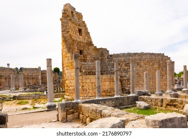 View of stone remains of Hellenistic city gate in ancient Greek settlement of Perge in Anatolia on spring day. Historical sights and archaeological sites of Turkey
