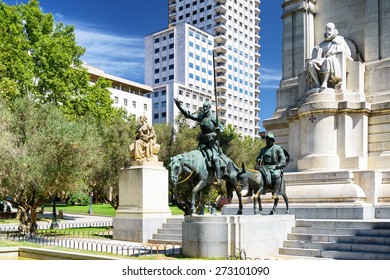 View of the stone sculpture of Miguel de Cervantes and bronze sculptures of Don Quixote and Sancho Panza on the Square of Spain (Plaza de Espana). Madrid is a popular tourist destination of Europe.