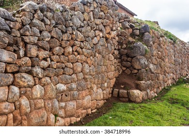 View Of The Stone Wall Of Large Stones Of Different Sizes In The District Of Chinchero, Peru