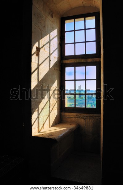 View from a stone window seat in the castle at\
Chateauneuf in Burgundy,\
France
