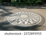 View of Strawberry Fields Memorial in Central Park, New York City, honoring Beatles legend John Lennon and named after their iconic song 