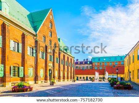 View of a street with brick buildings in Goteborg, Sweden.
