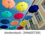 View of the streets of Aigio city. Umbrella decoration on the street. Peloponnese. Greece.