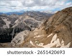 View from the summit of Tofana di Mezzo mountain to Tofana de Dentro, Dolomites, Italy
