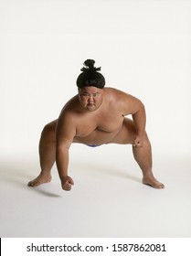 View Of A Sumo Wrestler Squatting