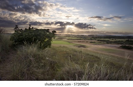 View Of Sunset Across Links Golf Course