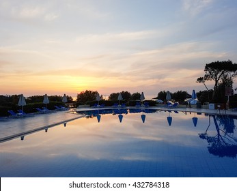 View of the sunset by the pool