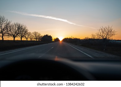 View of sunset from inside of car