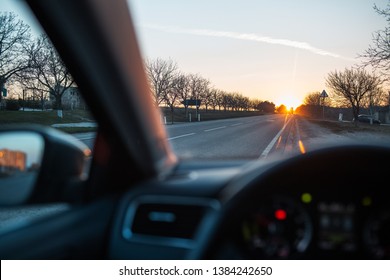 View of sunset from inside of car.