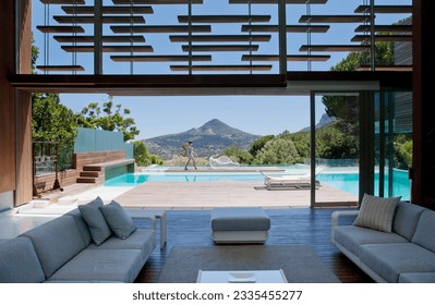 View of swimming pool and mountains - Powered by Shutterstock