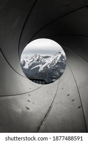 View Of The Swiss Alps Through A Gun Barrel