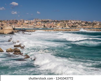The view of Syracuse cityscape from the local promenade, Sicily, Italy