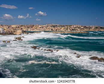 The view of Syracuse cityscape from the local promenade, Sicily, Italy