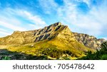 View of Table Mountain, Devils Peak and the Twelve Apostles from the hiking trail to the top of Lions Head mountain near Cape Town South Africa on a nice winter day