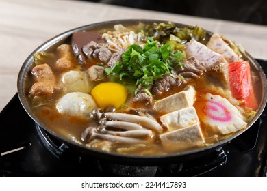 A view of a Taiwanese hot pot on a portable stove. - Shutterstock ID 2244417893