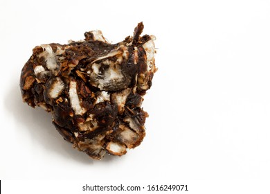 View Of Tamarind Pulp Over A White Background.