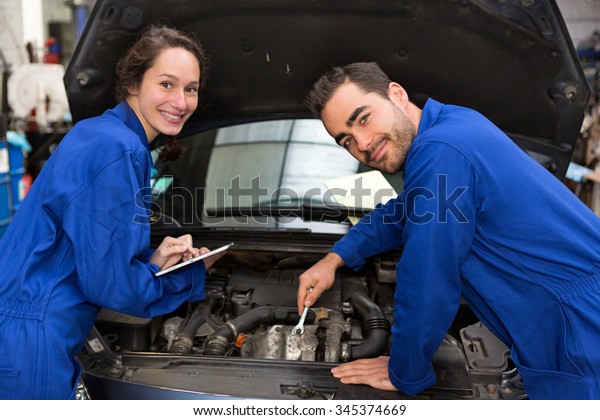 View of a\
Team of mechanics working at the\
garage